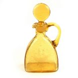 A Continental European amber glass decanter and stopper, 19th century.