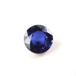 Loose circular cut synthetic sapphire.