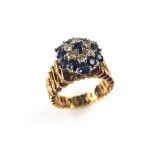 Yellow gold sapphire and diamond ring.