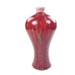 A Chinese peach blossom glazed vase.