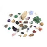 Collection of mineral specimens. Including a quartz crystal cluster specimen, an amethyst crystal