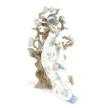 A large Lladro porcelain figurine of a Japanese lady.
