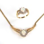 14 ct yellow gold opal and diamond necklace and ring.