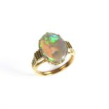 Yellow gold opal ring.