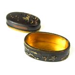 A Japanese miniature fuchi and kashira snuff box or pill box, Meiji period (1868 - 1912).