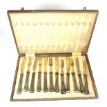A set of six Hungarian partially gilt silver fruit knives.