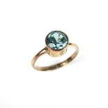 9 ct yellow gold blue zircon ring.