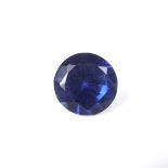 Loose circular cut synthetic sapphire.