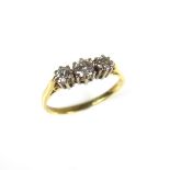 18 ct yellow gold three stone diamond ring.