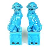 A large pair of Chinese turquoise glazed dogs of fo, 20th century.