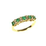 18 ct yellow gold emerald and diamond ring.