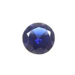 Loose circular cut synthetic sapphire.