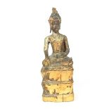 A carved wooden Buddha with traces of gilding, Thailand or Laos, possibly 18th century or later.
