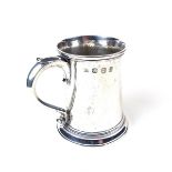 A George III silver tankard.