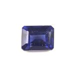 Loose emerald cut synthetic sapphire.
