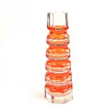 A faceted coloured glass vase in the manner of Josef Hoffmann / Moser.