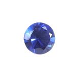 Loose circular cut synthetic sapphire.