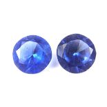 Pair of loose circular cut synthetic sapphires.