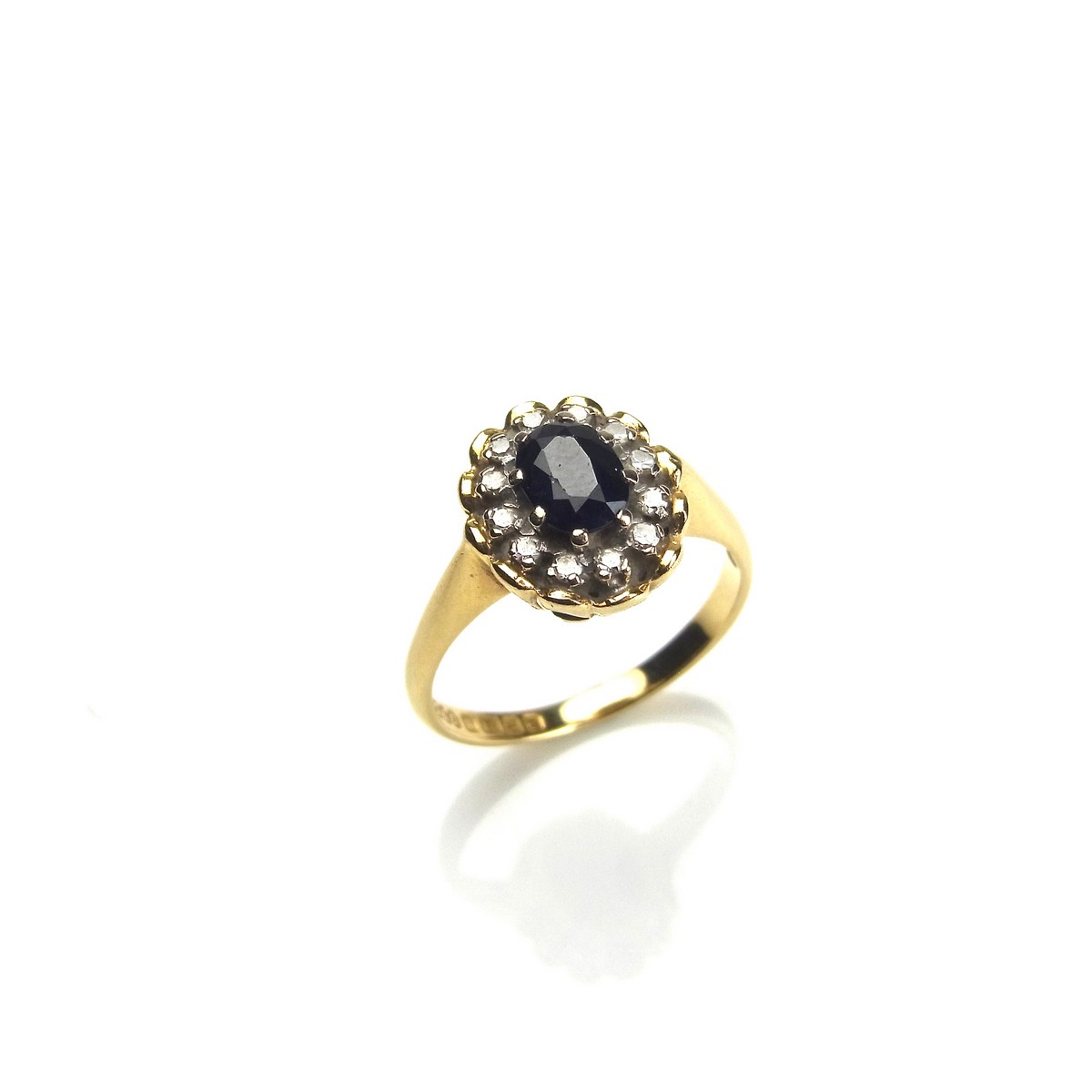 18 ct yellow gold sapphire and diamond ring.