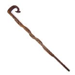 A shepherd's crook handled cane walking stick.