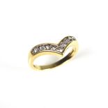 18 ct yellow gold diamond wishbone ring.