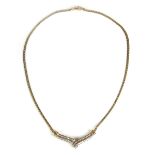 18 ct yellow gold diamond V-pendant necklace.