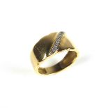 18 ct yellow gold diamond set ring.