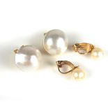 Two pairs of pearl earrings.