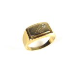 Yellow gold diamond set signet ring.