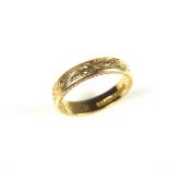 18 ct yellow gold wedding ring.