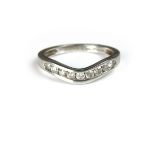 Platinum diamond wishbone ring.
