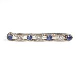 Sapphire and platinum bar brooch.