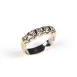 18 ct yellow gold five stone diamond ring.