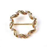 18 ct yellow gold diamond wreath brooch.