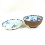 A Chinese Nanking Cargo blue and white porcelain bowl and dish, mid 18th century.