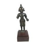 An Indian bronze of a Hindu deity, Tamil Nadu, India, probably 19th century.