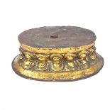 A Sino - Tibetan gilt copper lotus base for a Buddha image, Tibet or China, circa 15th century.