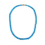 Blue bead necklace.