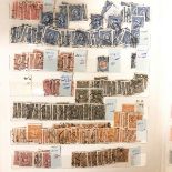 A large collection of Chinese postage stamps compiled in one album, early/mid 20th century.