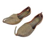 A pair of traditional Mughal Islamic Indian leather slippers or shoes, India, early 20th century.