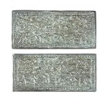 A pair of Malay or Peranakan silver pillow end plaques, early 20th century.