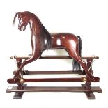 A mahogany rocking horse by the British Rocking Horse Society, 20th century.