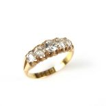 18 ct yellow gold five stone diamond ring.