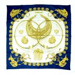 A Hermes Paris 'Les Cavaliers D'or' silk square scarf.