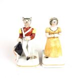 A pair of porcelain cat quill pen holders, 20th century.