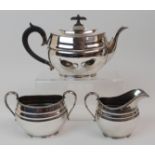 A THREE PIECE SILVER TEA SERVICE by Hamilton & Inches, Edinburgh 1912, of oval form in the