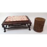 A CHINESE HARDWOOD RECTANGULAR LOW STAND carved as faux bamboo, 33cm wide x 25cm deep x 12cm high