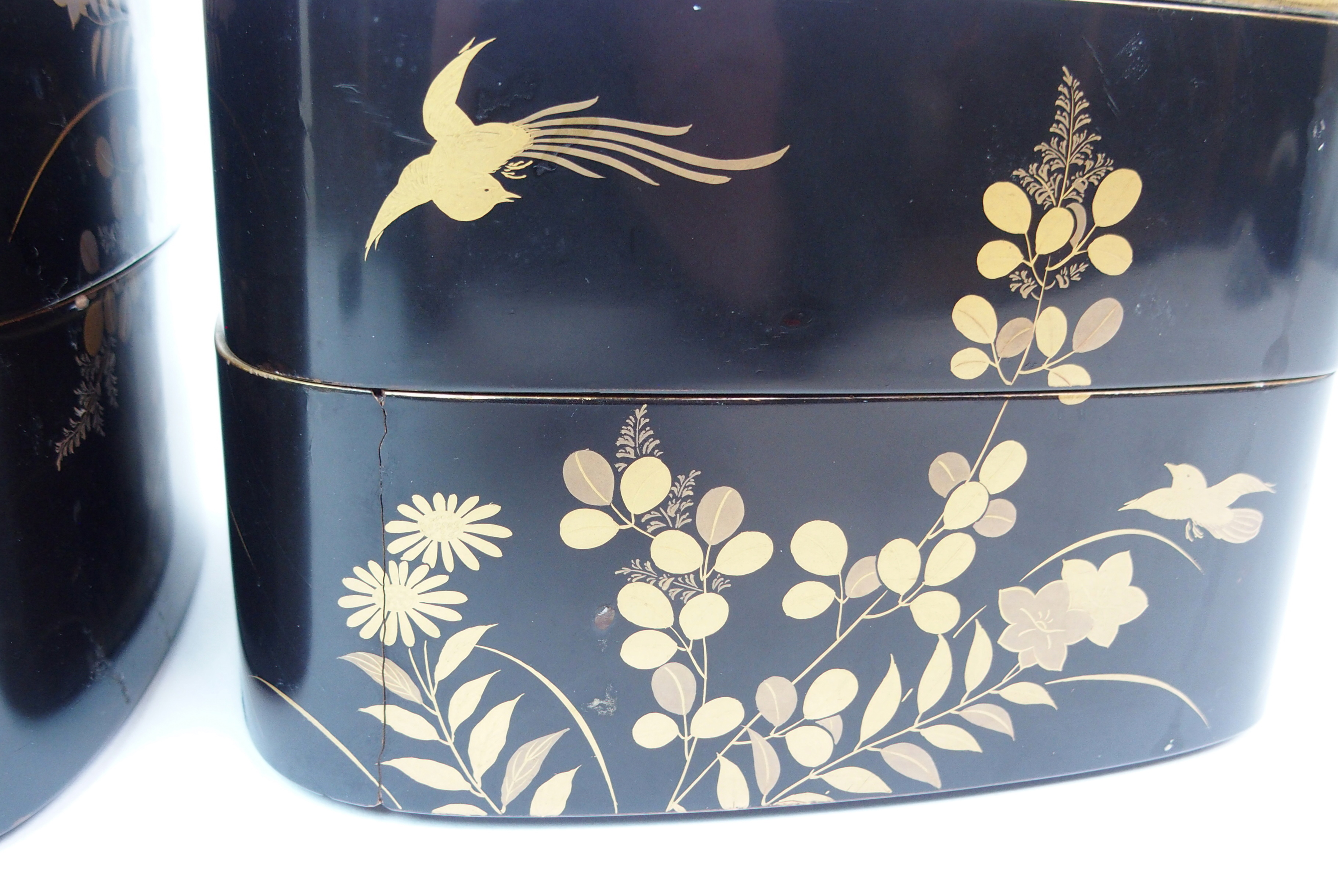 TWO BLACK AND GOLD LACQUERED TWO-SECTION BOXES decorated with birds amongst foliage (cracks and - Image 7 of 14