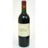 A BOTTLE OF CHATEAU MARGAUX 1992, PREMIER GRAND CRUCLASSE label stained and torn, 75cl, 12.5%vol