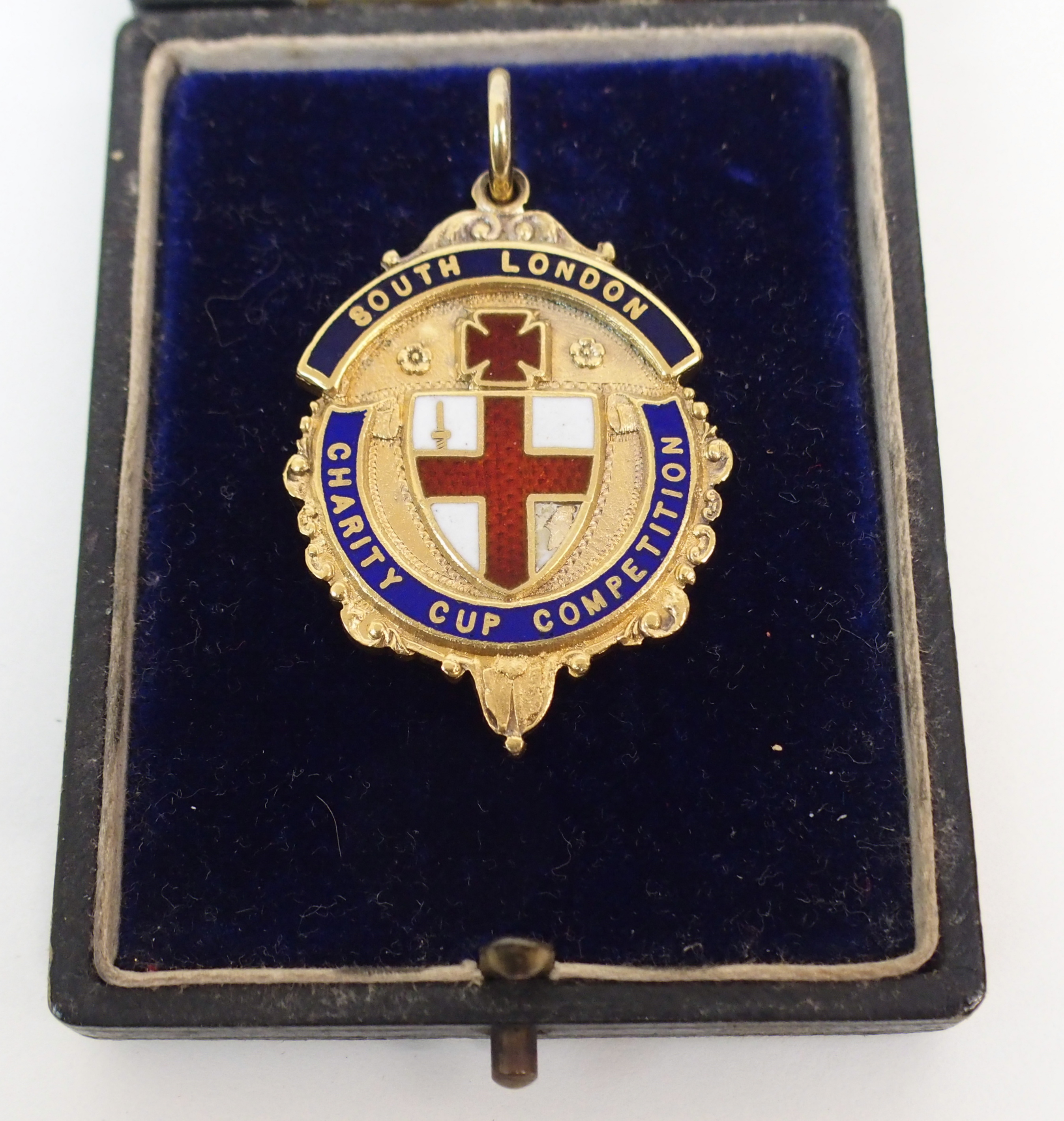 A SILVER-GILT AND ENAMEL SOUTH LONDON FOOTBALL MEDAL the obverse inscribed South London, Charity Cup